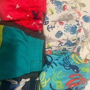 Boys 3T swim shorts, girls 9 and 12mo